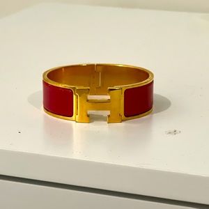 Red and gold Hermes bracelet
